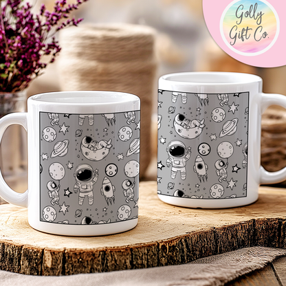 Doodle Astronaut Coffee Mug - Gift Mug for Space Enthusiasts - Black and White Doodle Astronauts on a White Coffee Mug