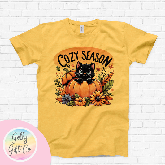 Fall/Thanksgiving It's Cozy Season - Black Cat in a Pumpkin T-Shirt (Bella Canvas) - Golly Gift Co