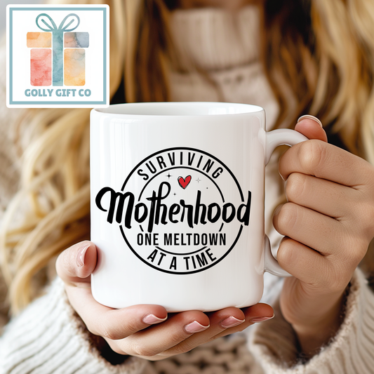 Surviving Motherhood One Meltdown at a Time - Funny Coffee Mug for Mom